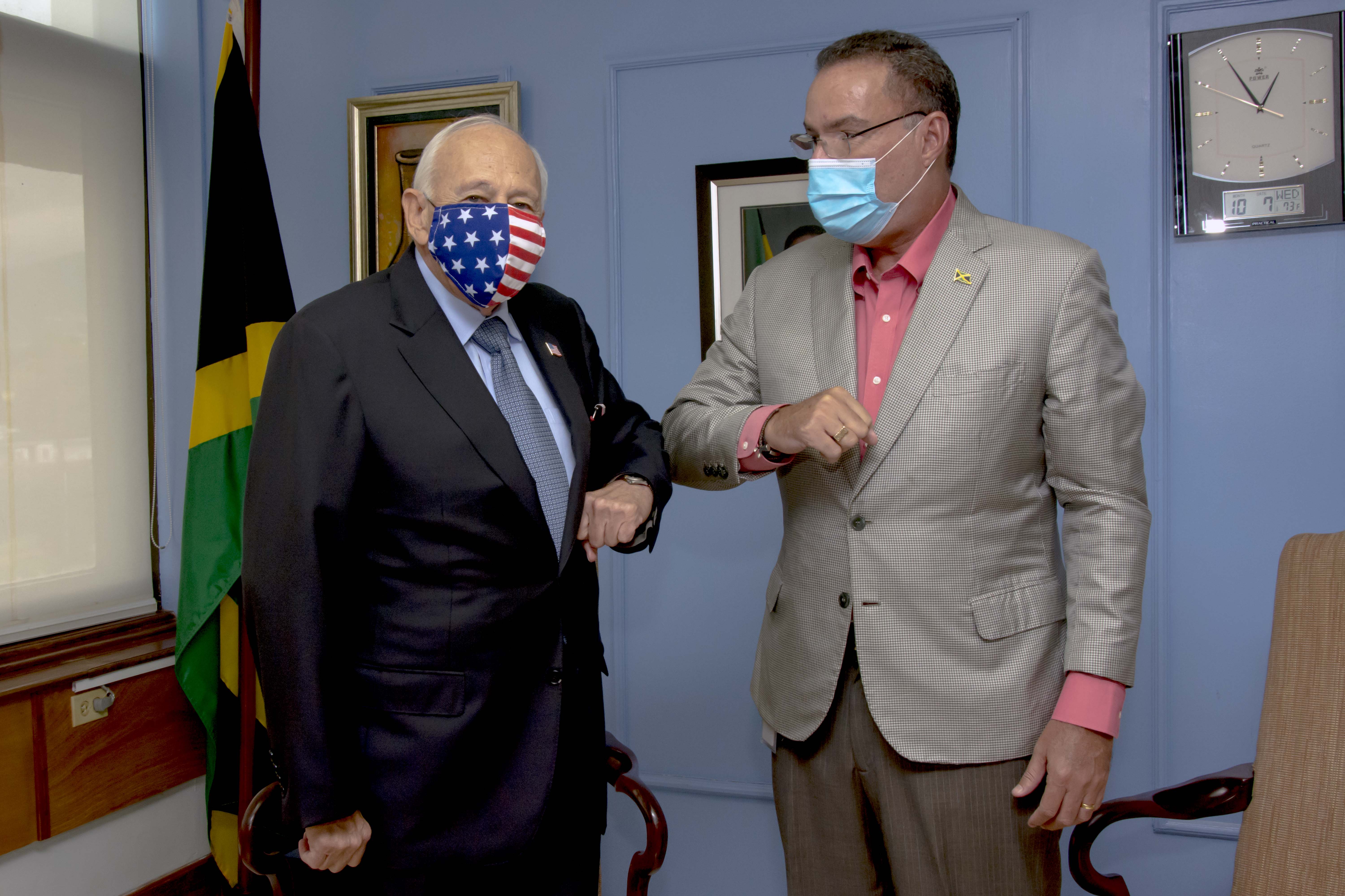 Minister of Science, Energy and Technology Hon. Daryl Vaz (right) greets United States Ambassador Donald Tapia (left) during a courtesy call on the Minister on October 7, 2020.
